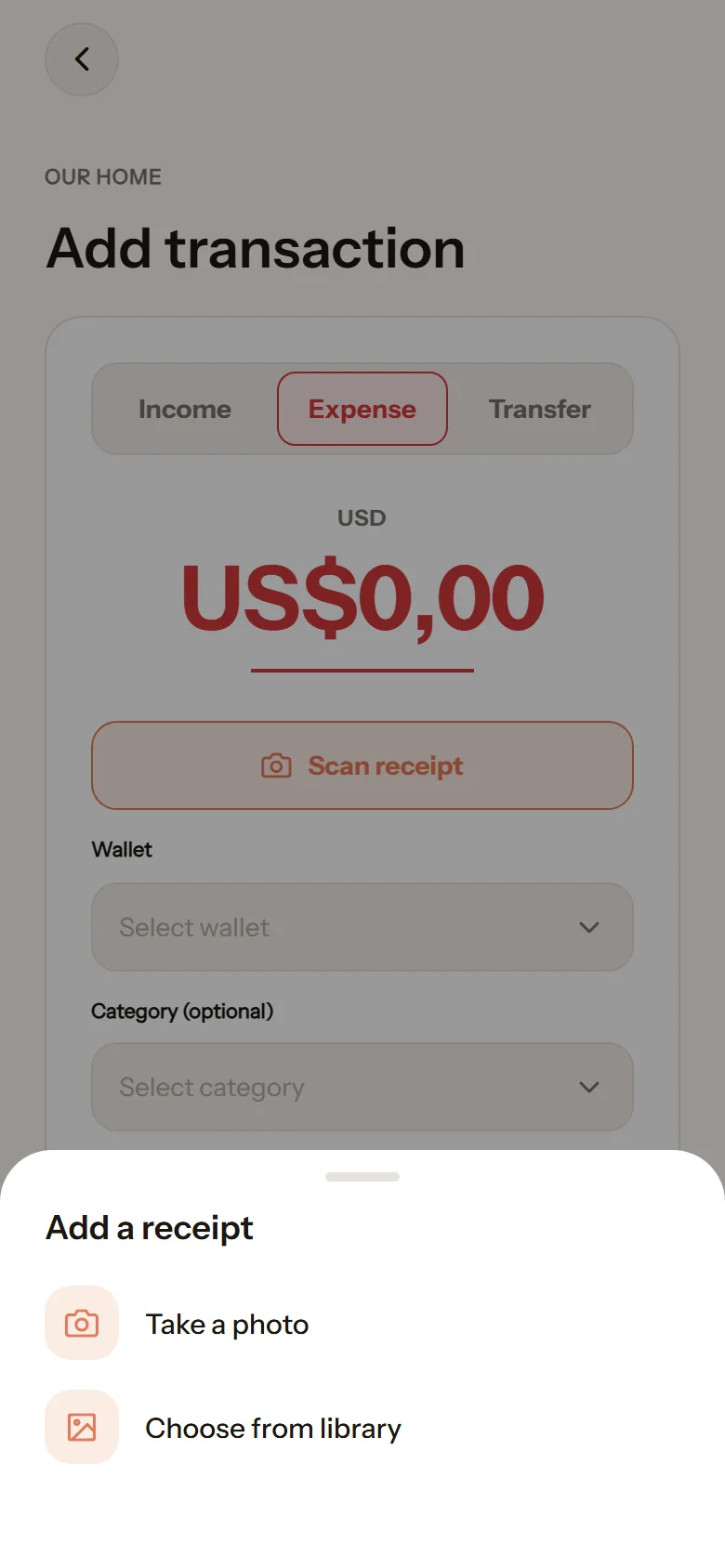 The Add a receipt sheet over the add-transaction screen, with Take a photo and Choose from library